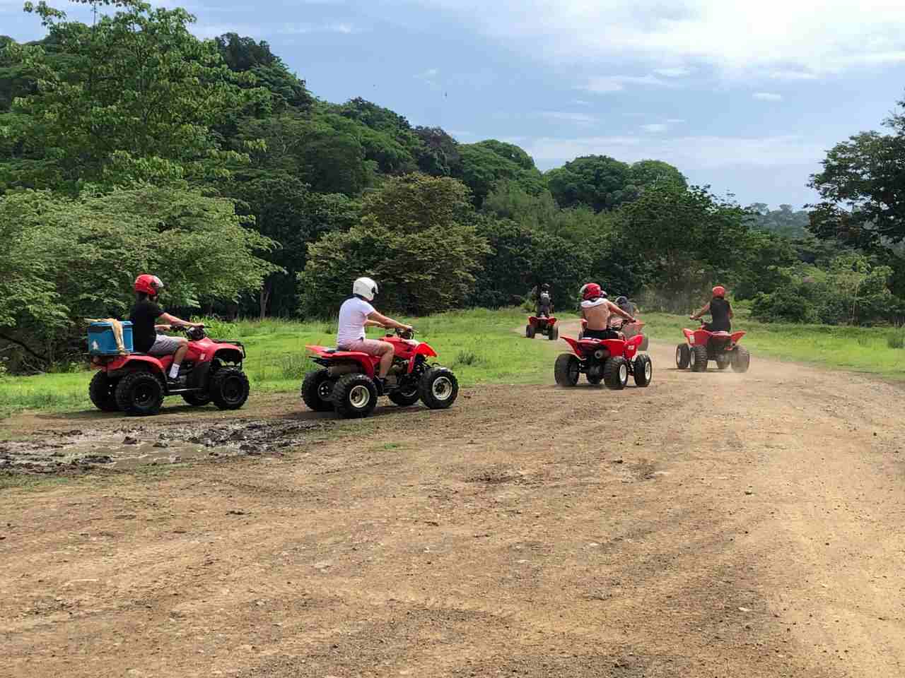 atv tour people riding off road