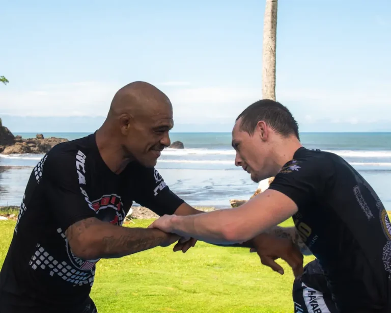 Jiu Jitsu sparring session by the beach at retreat in Jaco Costa Rica