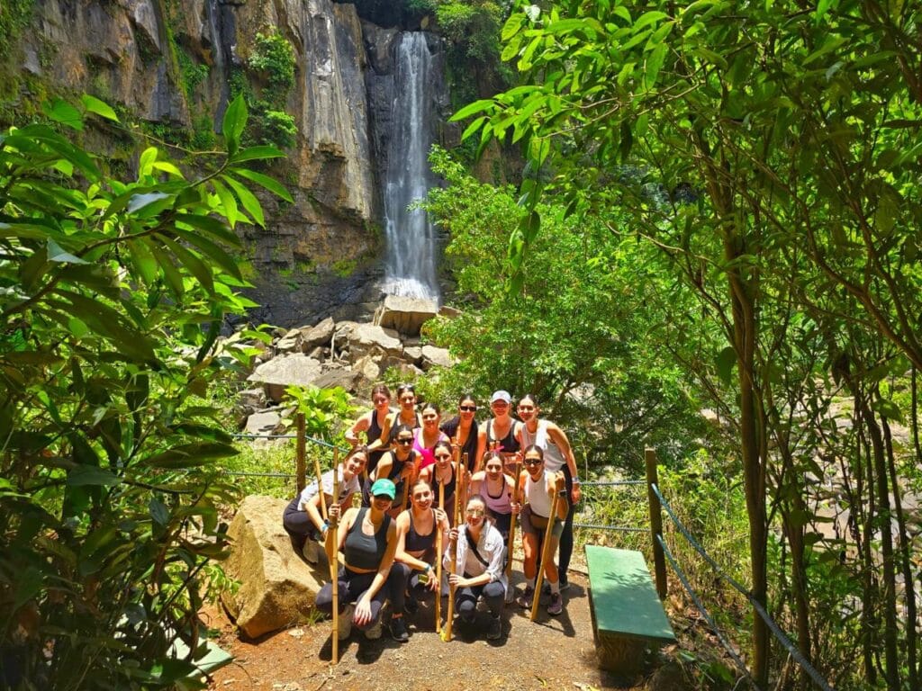 Group enjoying the view of Nauyaca Waterfalls in Costa Rica