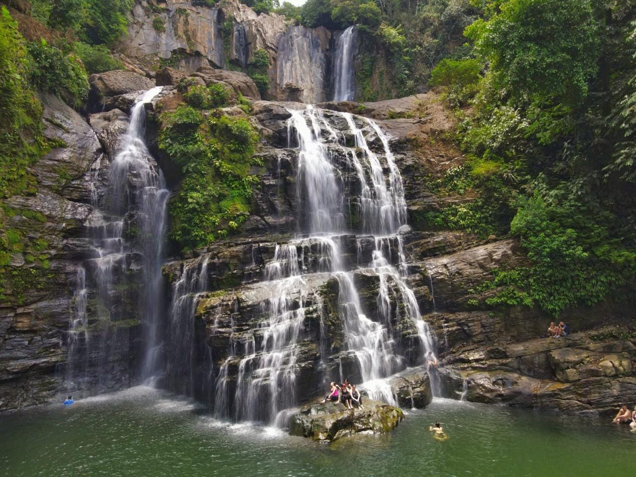 Main cascade of Nauyaca Waterfalls in Costa Rica surrounded by jungle