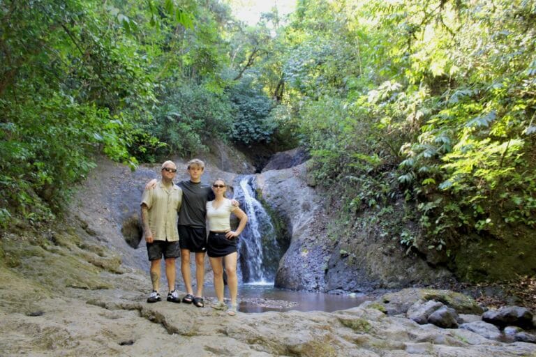 Family enjoying a hidden waterfall near Jaco Costa Rica
