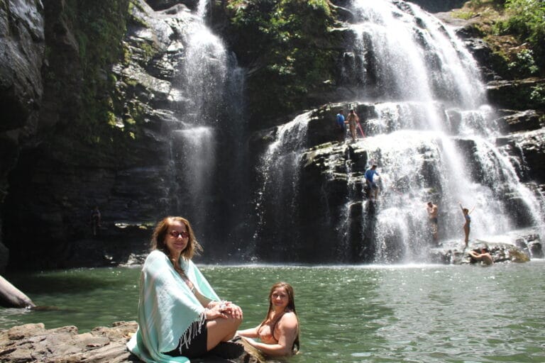 Couple enjoying Nauyaca Waterfalls during their Costa Rica adventure