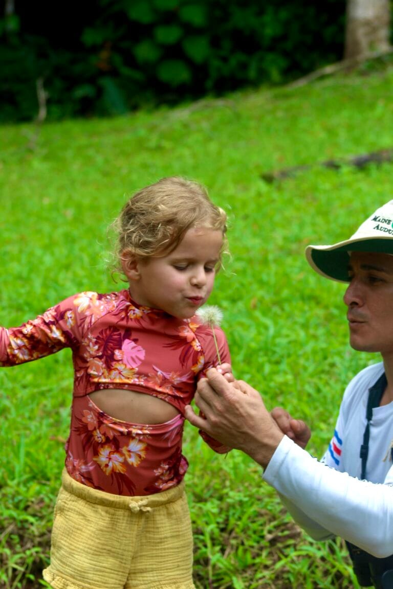 Family exploring a waterfall adventure near Jaco, Costa Rica
