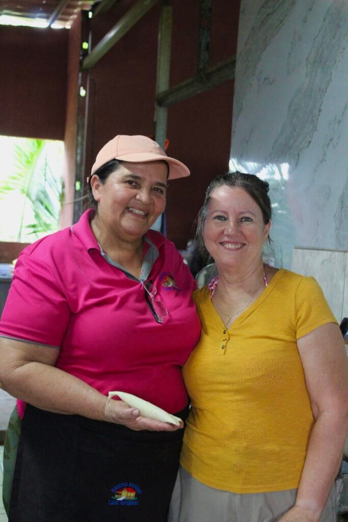 Guests preparing traditional Costa Rican food during a culinary experience near Jaco