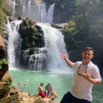 Tour guide showing Nauyaca Waterfall