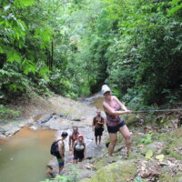 Travelers exploring the rainforest during a Jaco Waterfall Tour