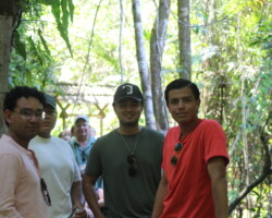 Friends exploring Manuel Antonio National Park with a local guide