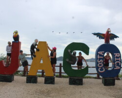 Group photo at the Jaco Costa Rica sign