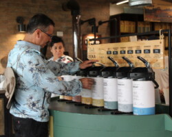 Guest enjoying a coffee tasting experience at Doka Coffee Plantation