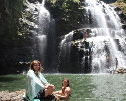 Couple enjoying Nauyaca Waterfalls during their Costa Rica adventure