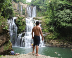 Guest admiring the scenery at Nauyaca Waterfalls