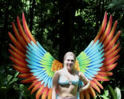 Guest at the wings photo spot during a Nauyaca Waterfall adventure