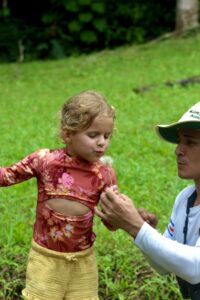 Family exploring a waterfall adventure near Jaco, Costa Rica