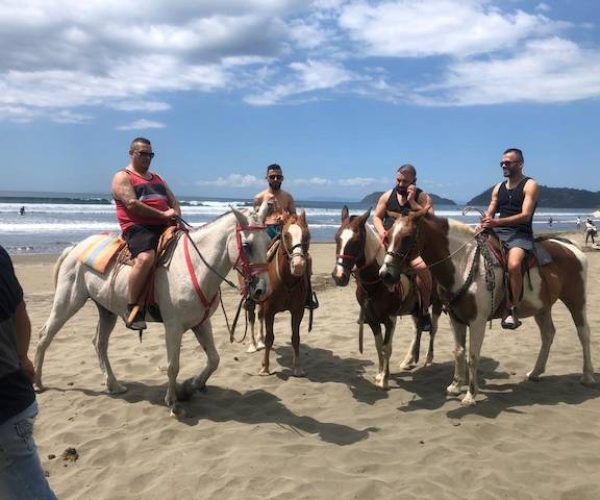 horse back riding jaco group at the beach