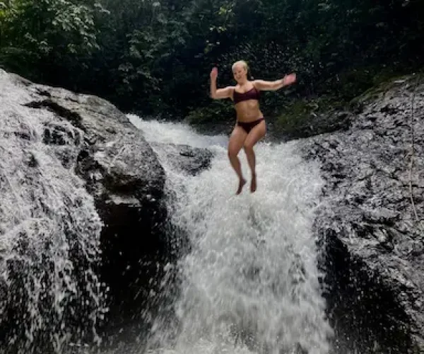 jaco waterfall with someone jumping