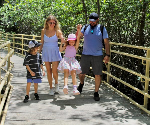 Family exploring Manuel Antonio National Park with a local guide
